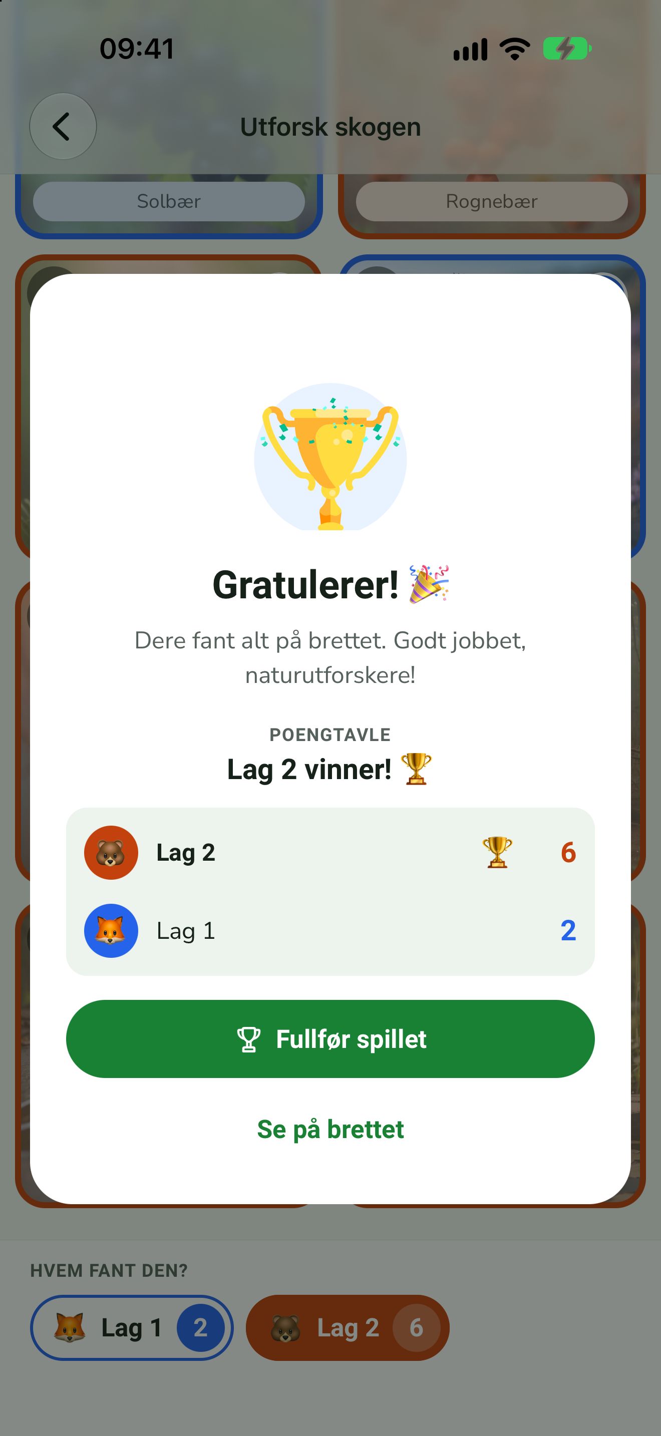 Gratulasjonsskjerm med trofé og poengtavle
